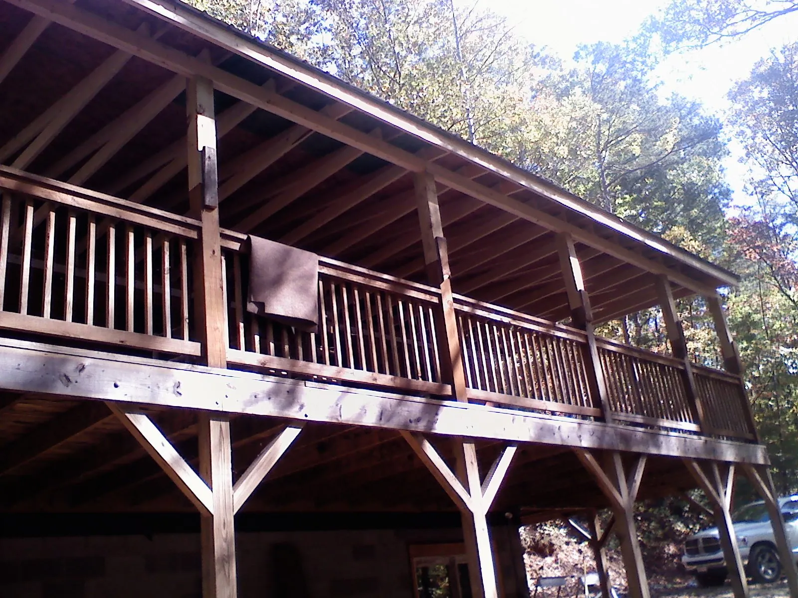 Timber framing under a new elevated porch and deck — Roof Leak Repair in Albin by Roofing Brothers
